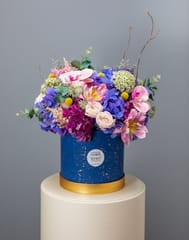 Blooming Gifts In Blue Round Box